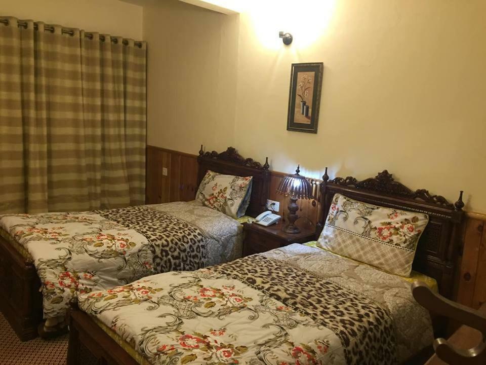 Embassy Villa Suites Karimabad  ภายนอก รูปภาพ