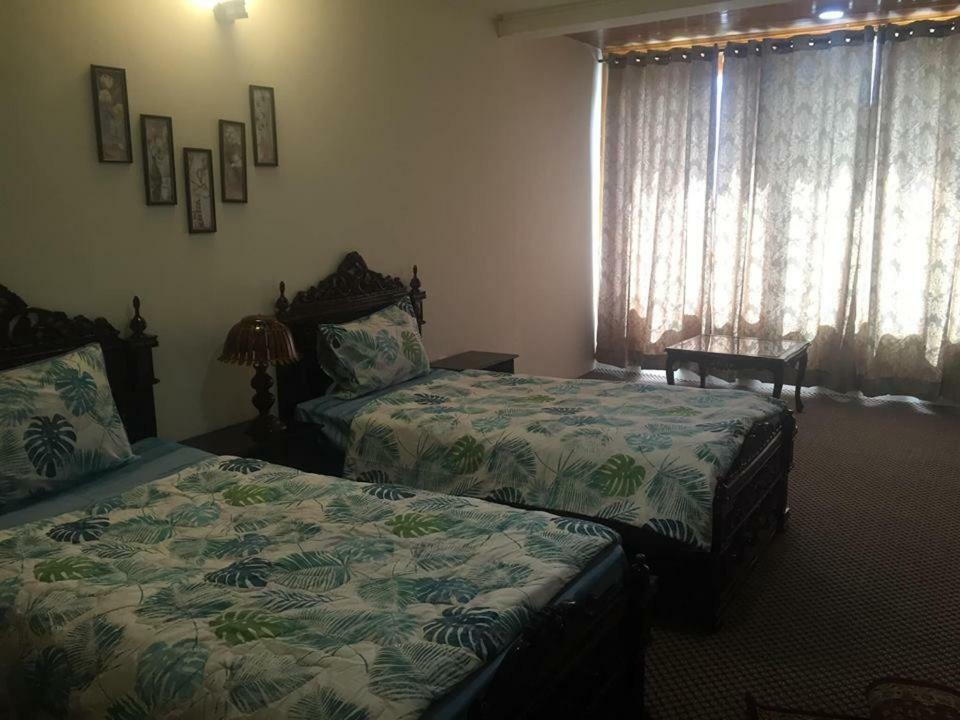 Embassy Villa Suites Karimabad  ภายนอก รูปภาพ