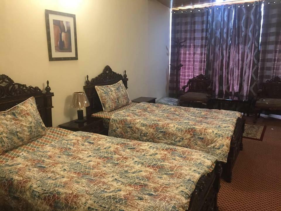 Embassy Villa Suites Karimabad  ภายนอก รูปภาพ